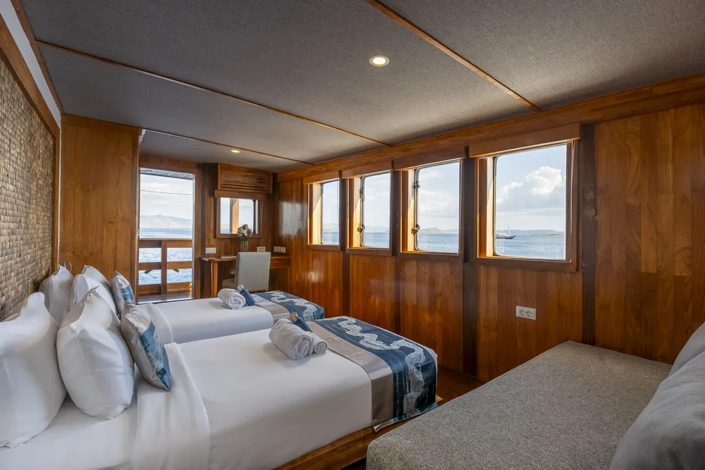 Double cabin with a bed and a sofa bed on Komodo Sea Dragon
